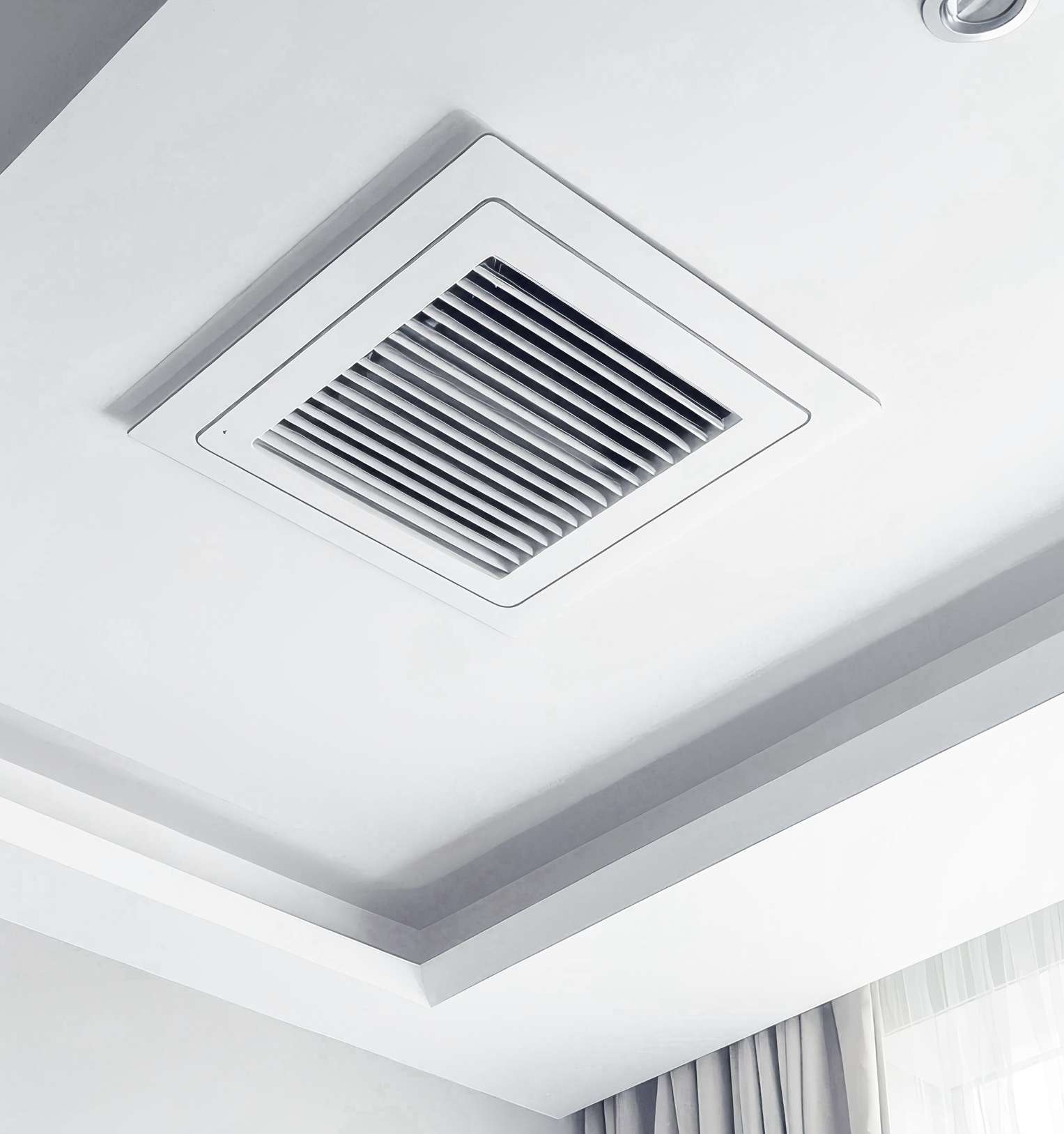 Close-up of recessed square ceiling vent