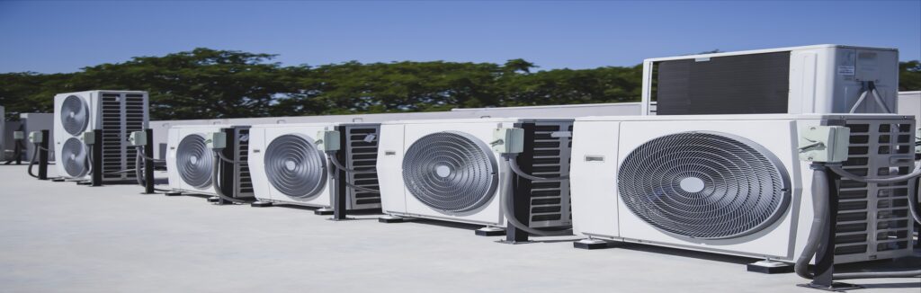 Line of rooftop HVAC condenser units
