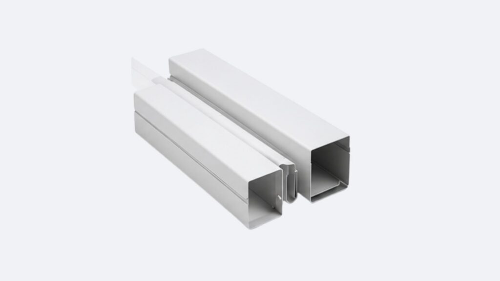 Two white rectangular cable trunking ducts