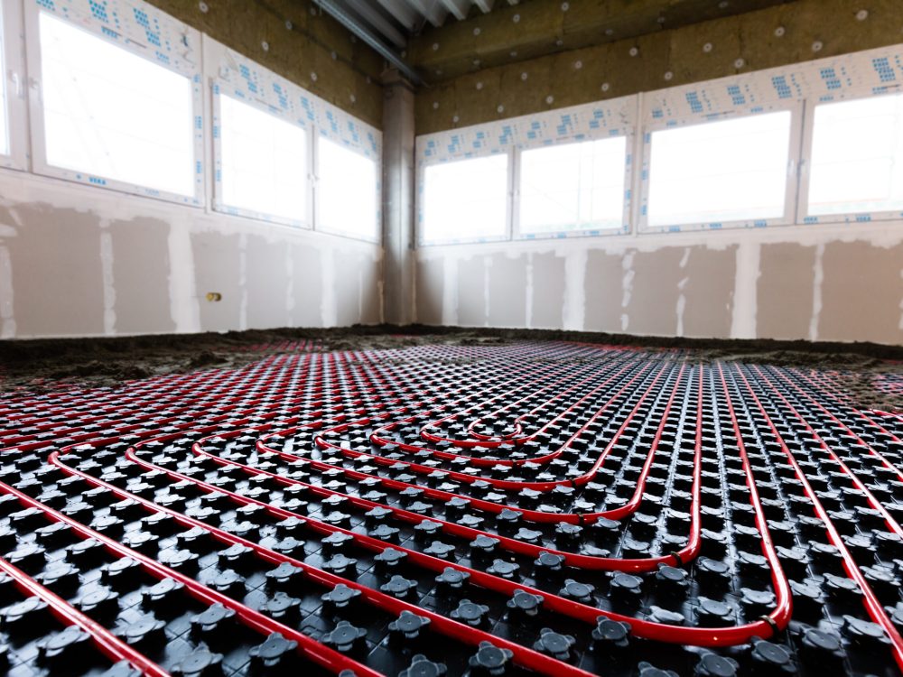 Floor heating in a new building. Interior design and finishing industry. Office and apartment